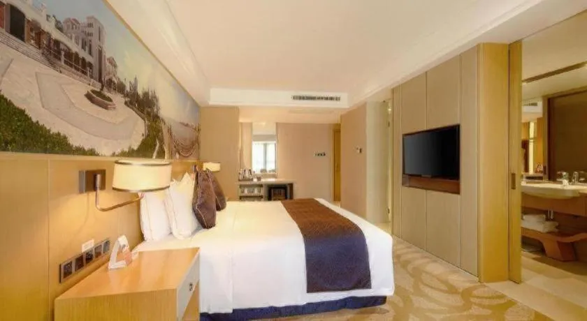 Bed in Sky World Hotel Qingdao