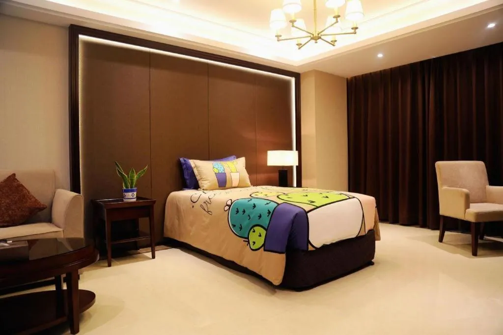 Bed in Sky World Hotel Qingdao