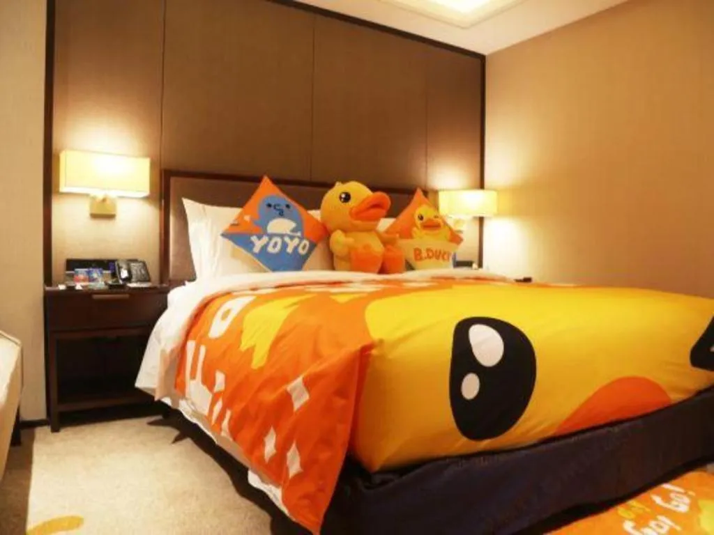 Bed in Sky World Hotel Qingdao