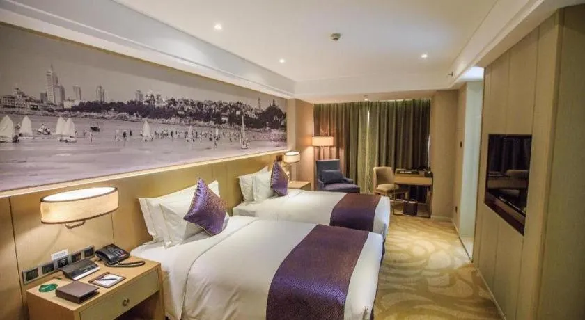 Bed in Sky World Hotel Qingdao