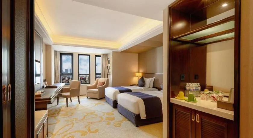 Bed in Sky World Hotel Qingdao