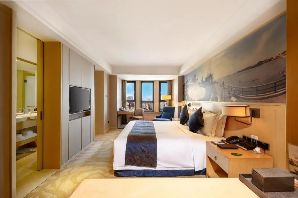 Bed in Sky World Hotel Qingdao