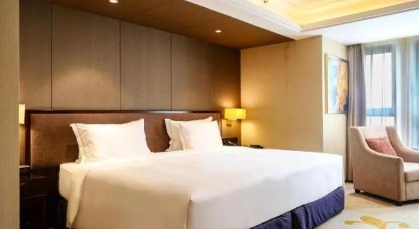 Bed in Sky World Hotel Qingdao