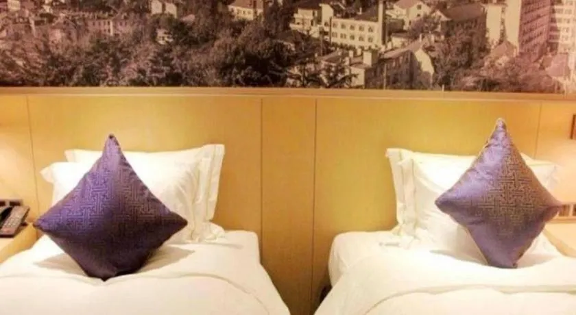 Bed in Sky World Hotel Qingdao