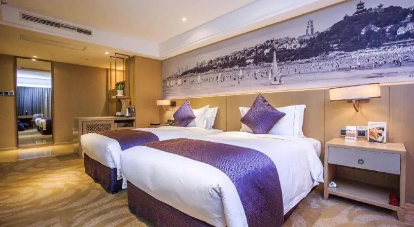 Bed in Sky World Hotel Qingdao