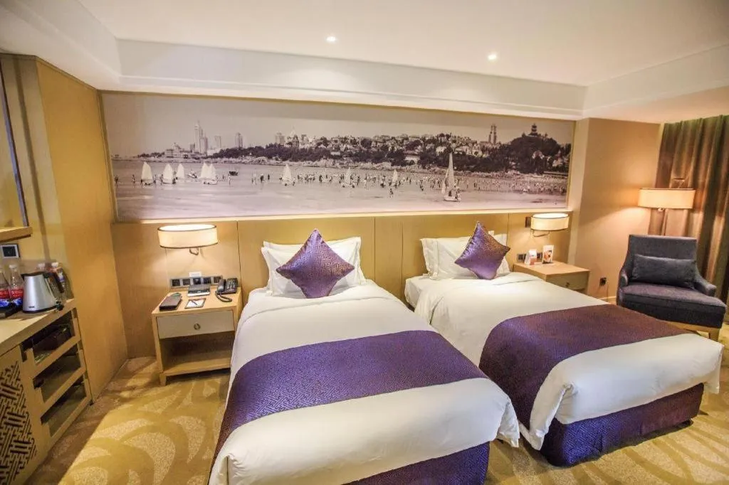 Bed in Sky World Hotel Qingdao