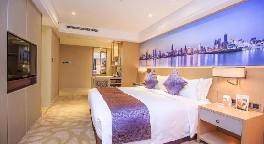 Bed in Sky World Hotel Qingdao