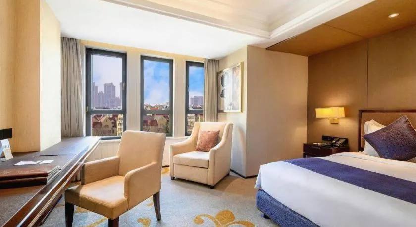 Bed in Sky World Hotel Qingdao