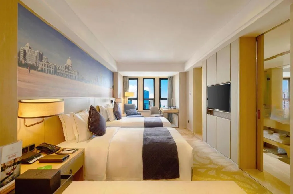 Bed in Sky World Hotel Qingdao