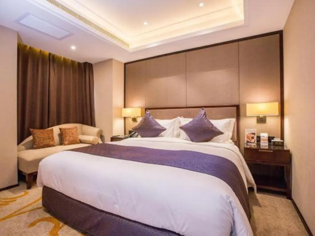 Bed in Sky World Hotel Qingdao