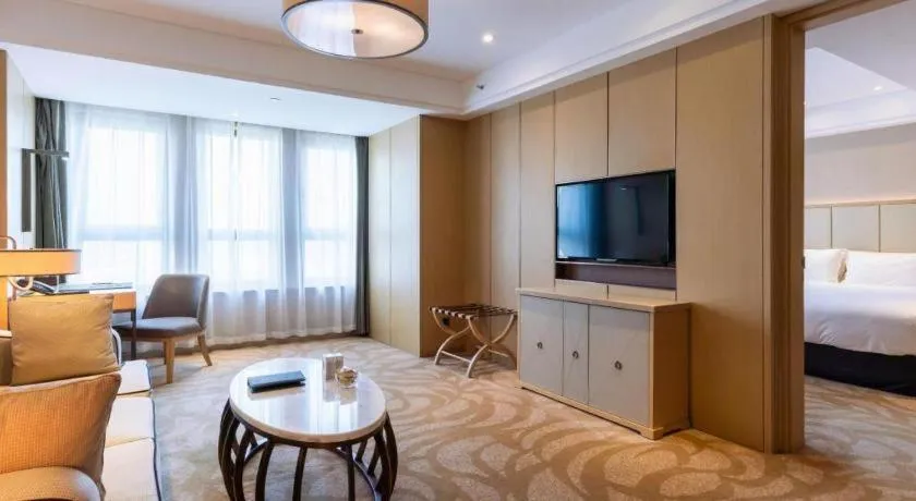 Bed in Sky World Hotel Qingdao