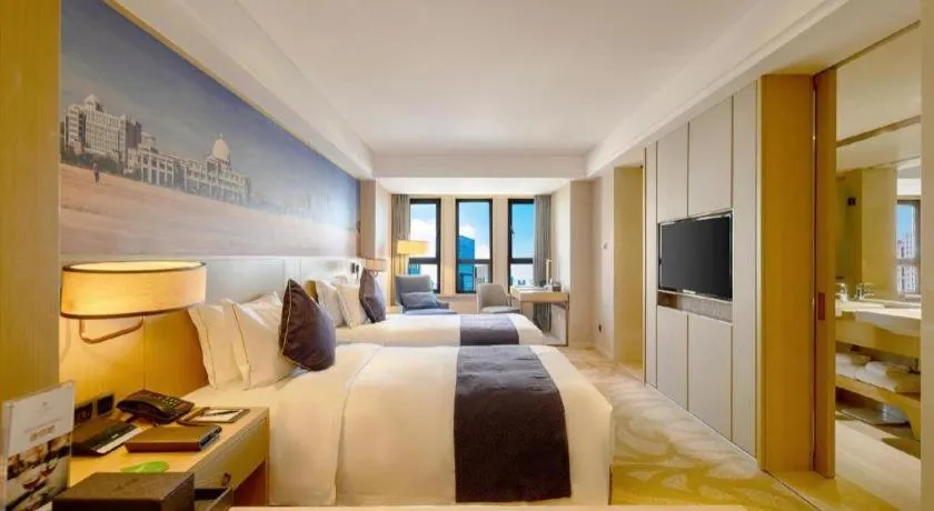 Bed in Sky World Hotel Qingdao