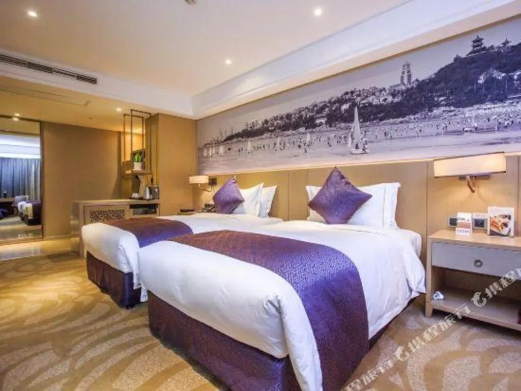 Bed in Sky World Hotel Qingdao