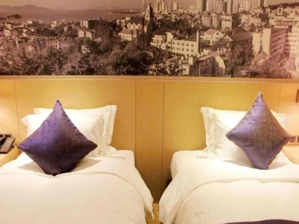 Bed in Sky World Hotel Qingdao