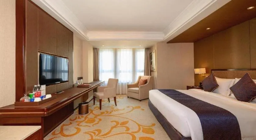 Bed in Sky World Hotel Qingdao