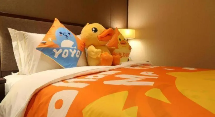 Bed in Sky World Hotel Qingdao