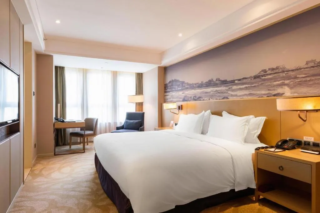 Bed in Sky World Hotel Qingdao