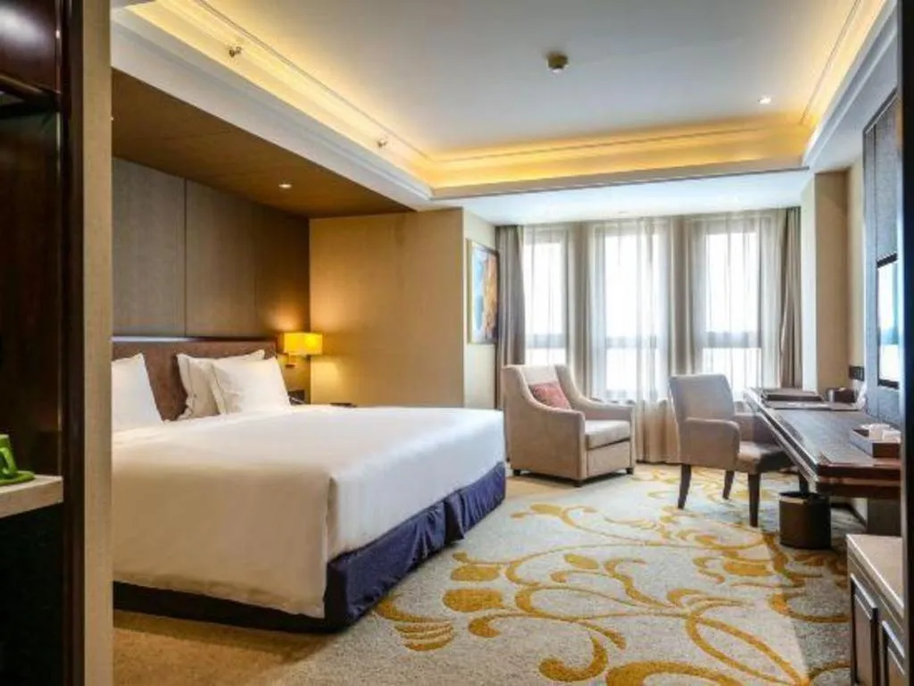 Bed in Sky World Hotel Qingdao