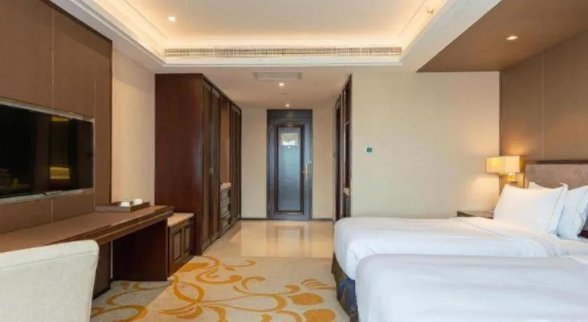 Bed in Sky World Hotel Qingdao