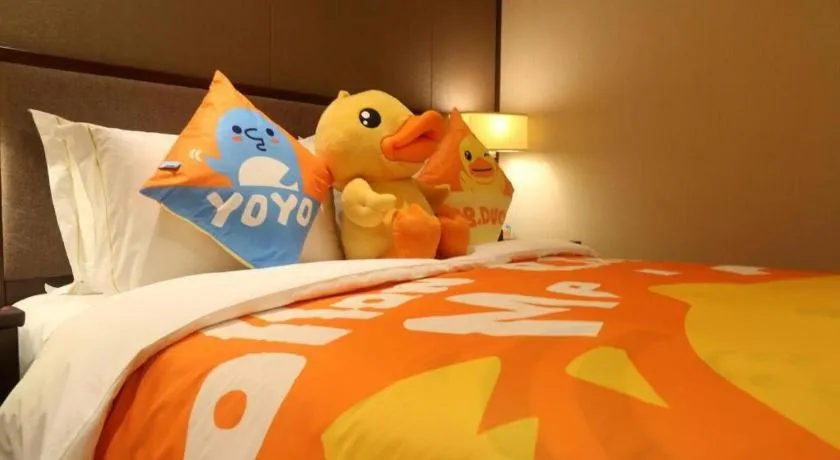 Bed in Sky World Hotel Qingdao