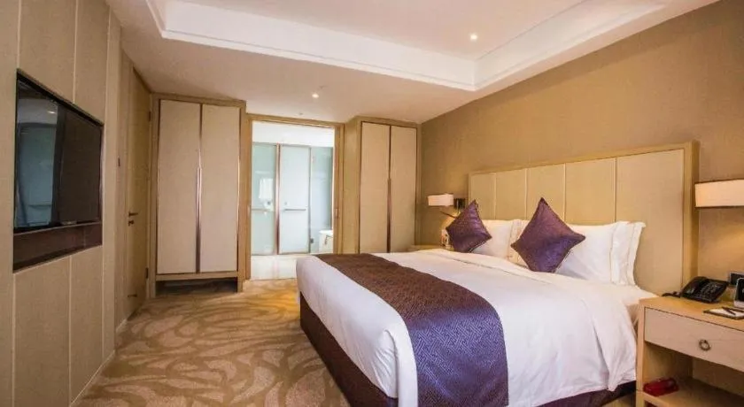 Bed in Sky World Hotel Qingdao