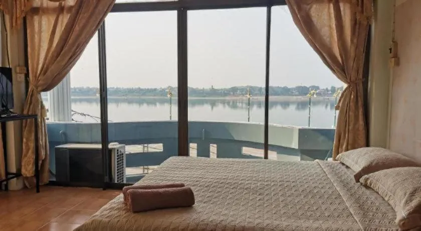 Bed in Just Mansion Hotel