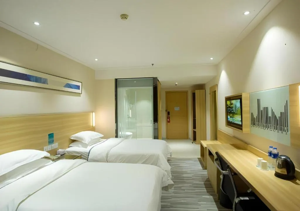 Bed in City Comfort Inn Huanggang Guibinlou Wanda Square