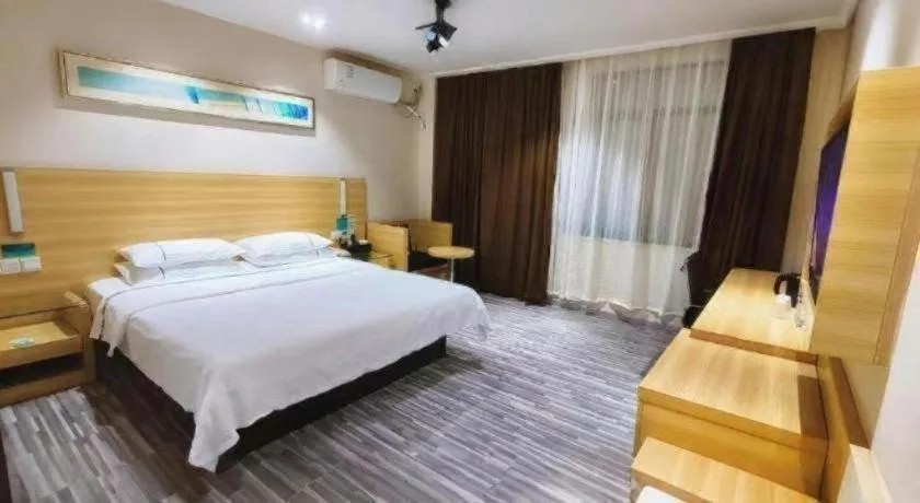 Bed in City Comfort Inn Huanggang Guibinlou Wanda Square