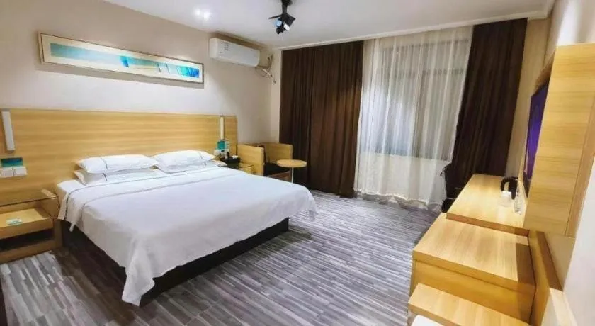 Bed in City Comfort Inn Huanggang Guibinlou Wanda Square