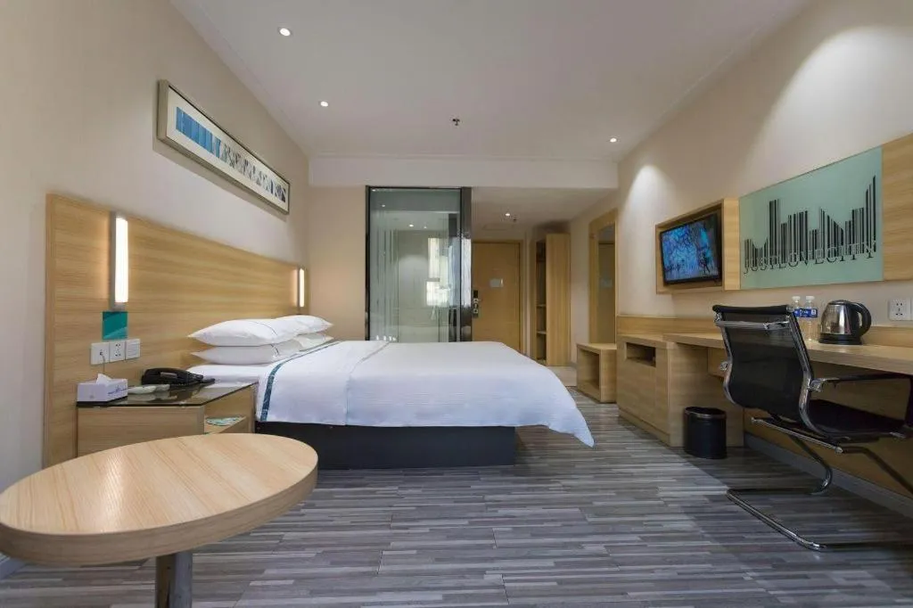 Bed in City Comfort Inn Huanggang Guibinlou Wanda Square