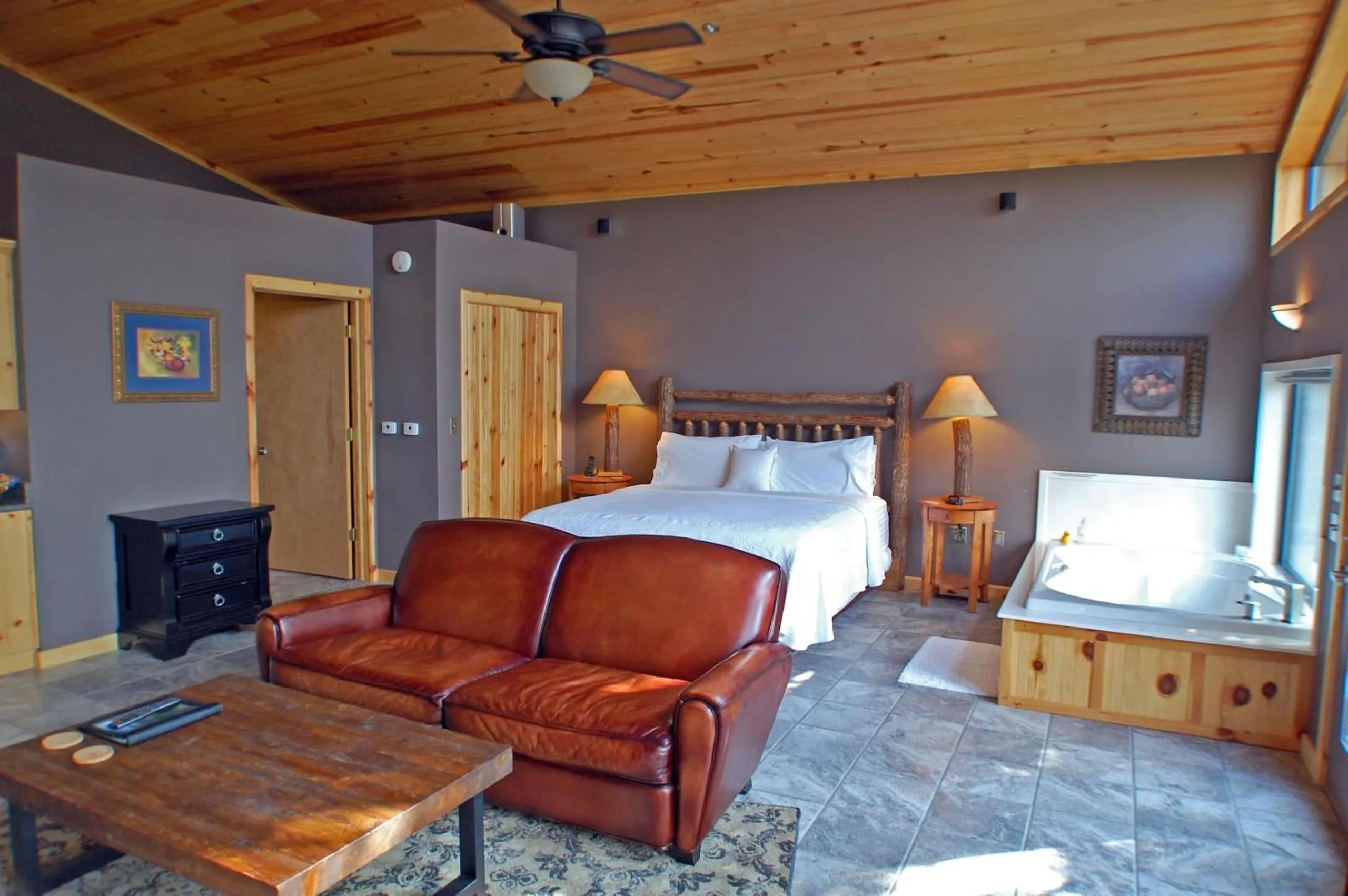 Bed in Beaver Lakefront Cabins - Couples Only Getaways