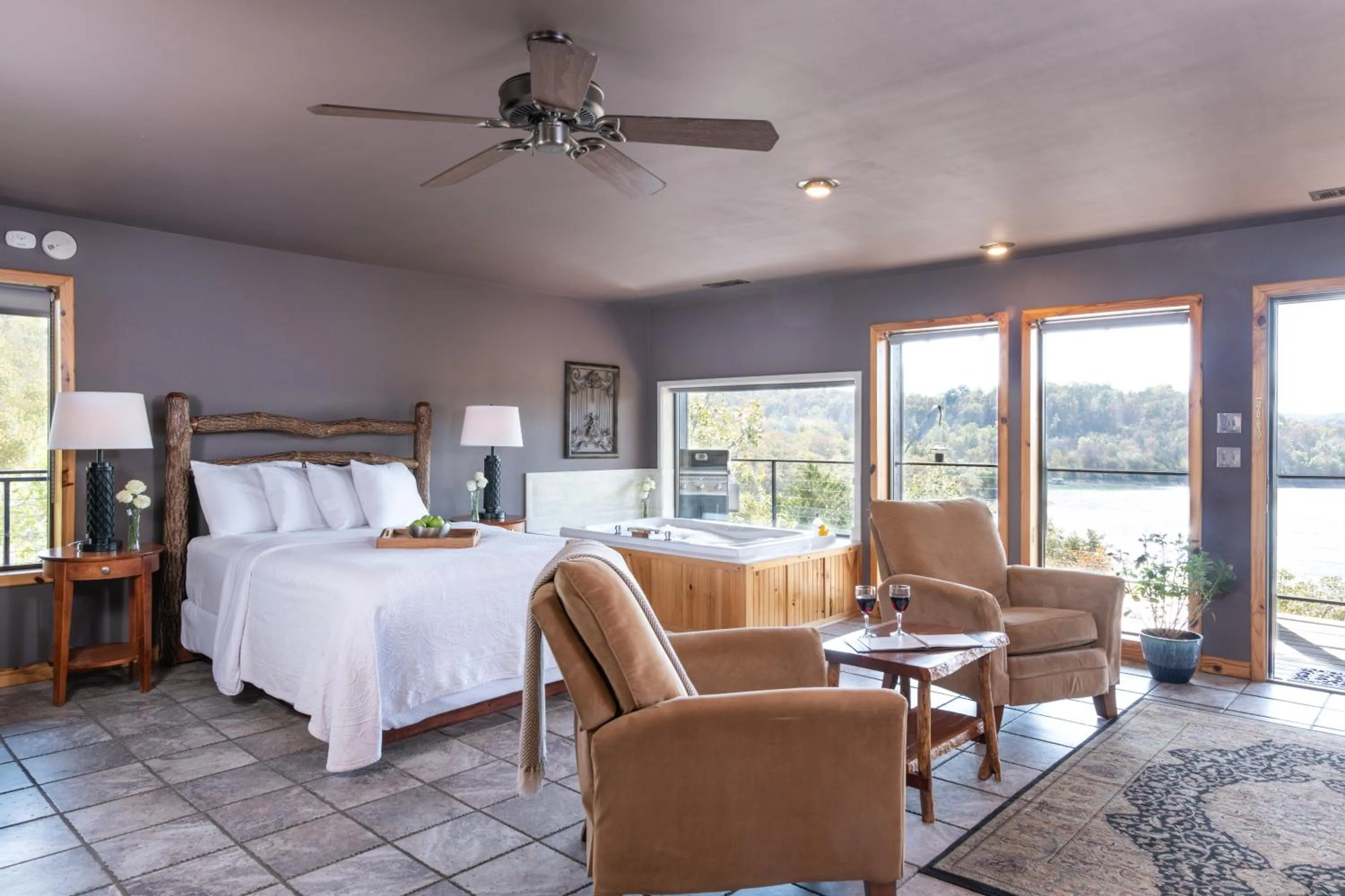 Living room, Bed in Beaver Lakefront Cabins - Couples Only Getaways