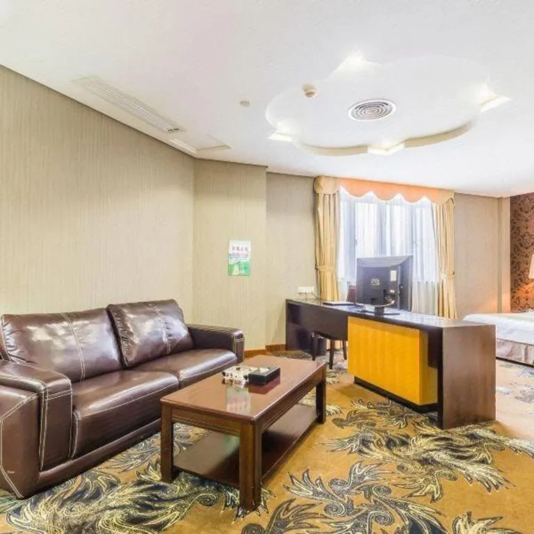 Bed in Foshan Nanhai Huifeng Holiday Hotel