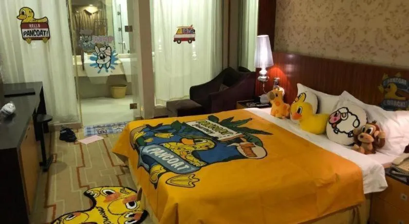 Bed in Foshan Nanhai Huifeng Holiday Hotel