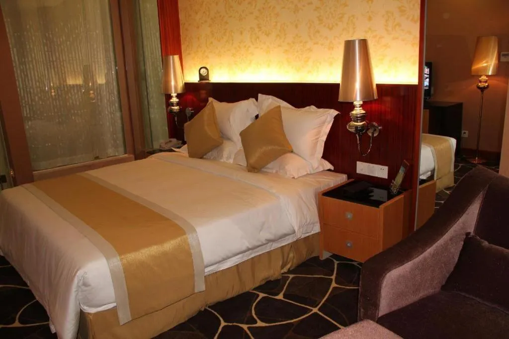 Bed in Foshan Nanhai Huifeng Holiday Hotel