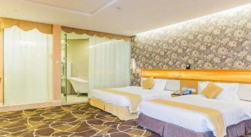 Bed in Foshan Nanhai Huifeng Holiday Hotel