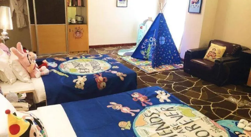 Bed in Foshan Nanhai Huifeng Holiday Hotel