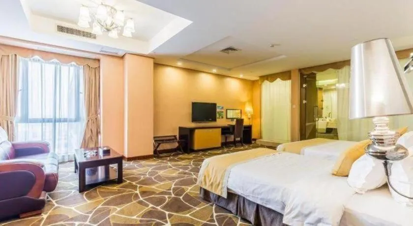 Bed in Foshan Nanhai Huifeng Holiday Hotel