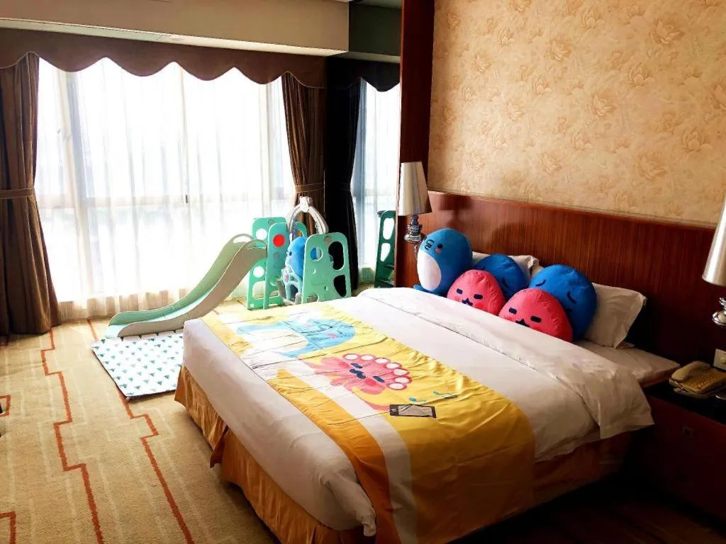 Bed in Foshan Nanhai Huifeng Holiday Hotel