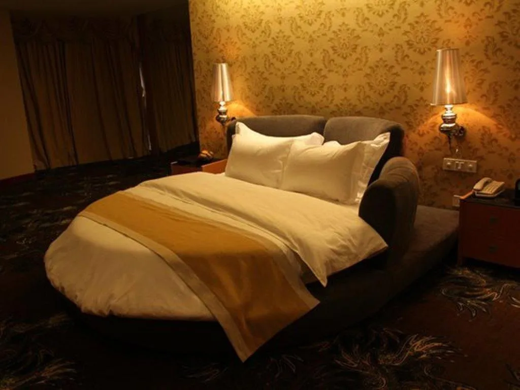 Bed in Foshan Nanhai Huifeng Holiday Hotel