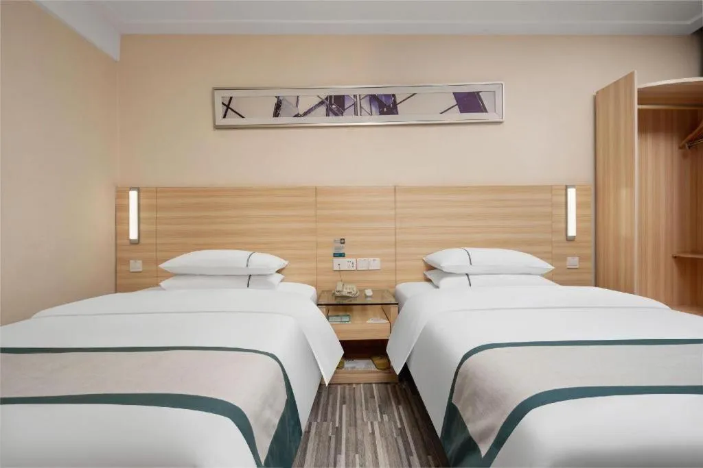 Bed in City Comfort Inn Liuzhou Chengzhong Wanda Plaza