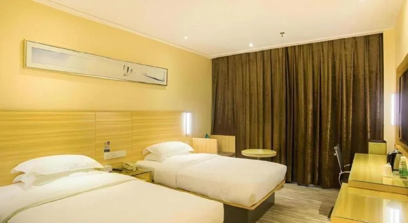 Bed in City Comfort Inn Liuzhou Chengzhong Wanda Plaza