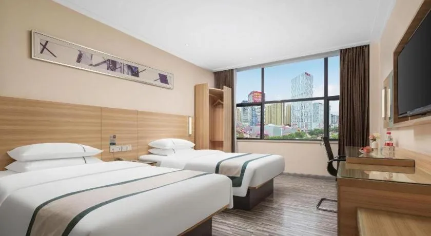 Bed in City Comfort Inn Liuzhou Chengzhong Wanda Plaza
