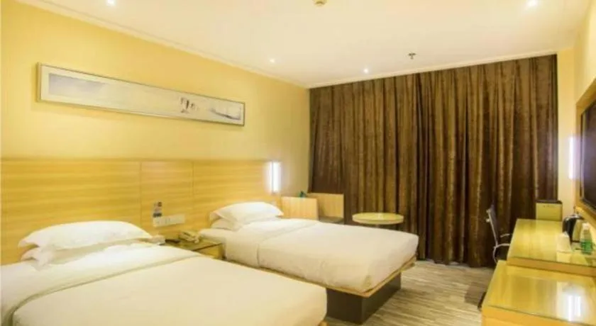 Bed in City Comfort Inn Liuzhou Chengzhong Wanda Plaza