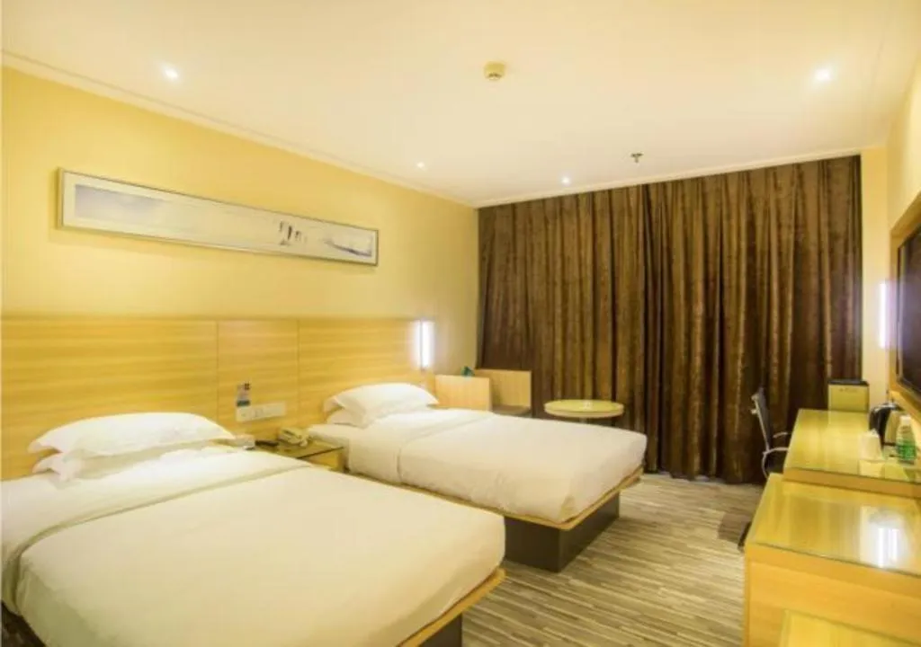Bed in City Comfort Inn Liuzhou Chengzhong Wanda Plaza