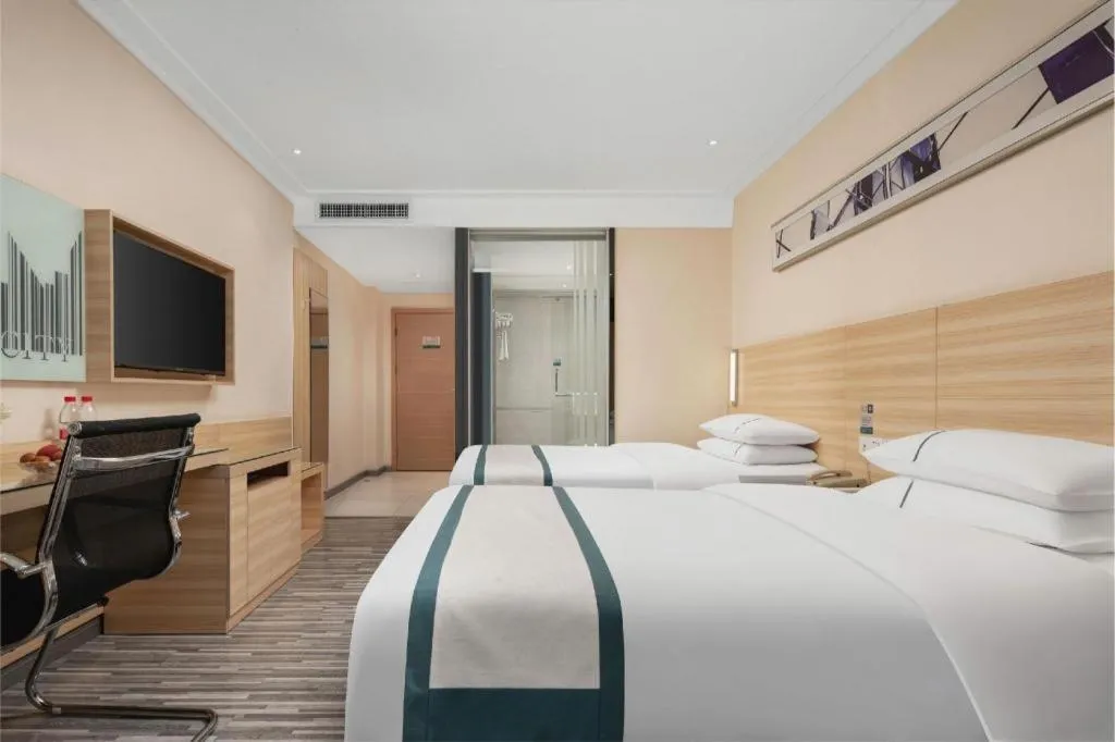 Bed in City Comfort Inn Liuzhou Chengzhong Wanda Plaza