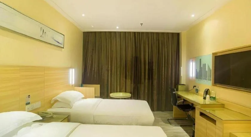 Bed in City Comfort Inn Liuzhou Chengzhong Wanda Plaza