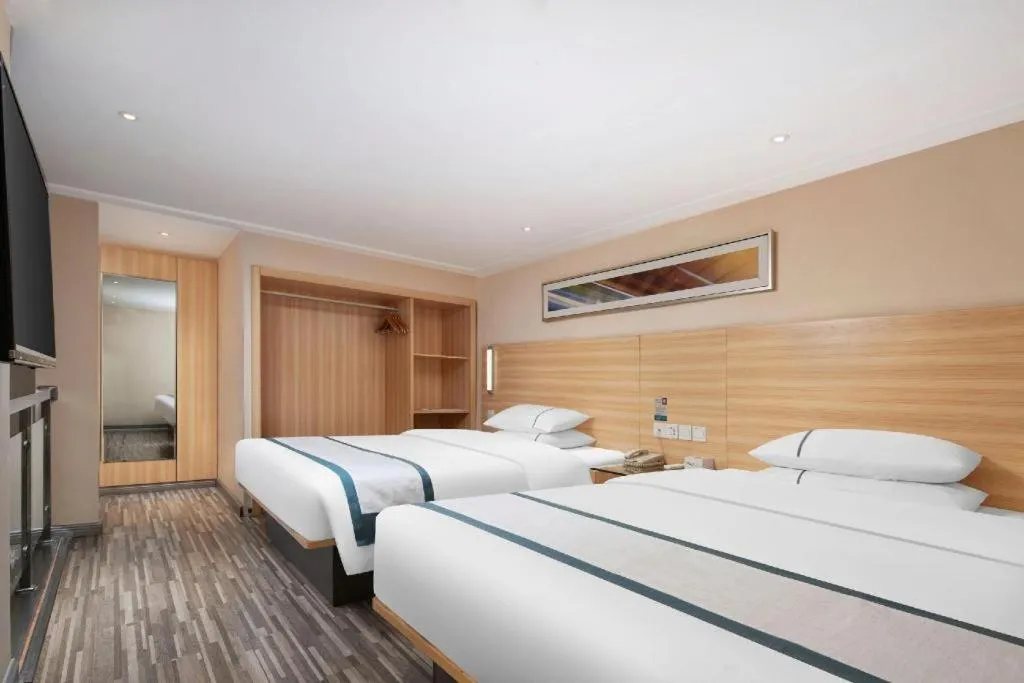 Bed in City Comfort Inn Liuzhou Chengzhong Wanda Plaza