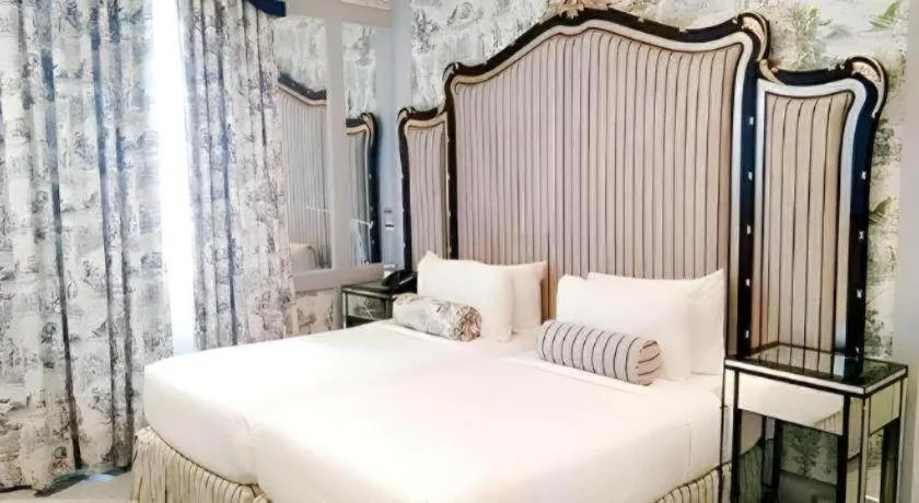 Bed in Kamiseta Hotel