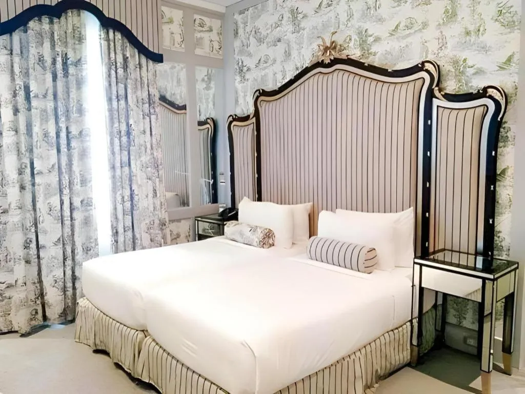 Bed in Kamiseta Hotel